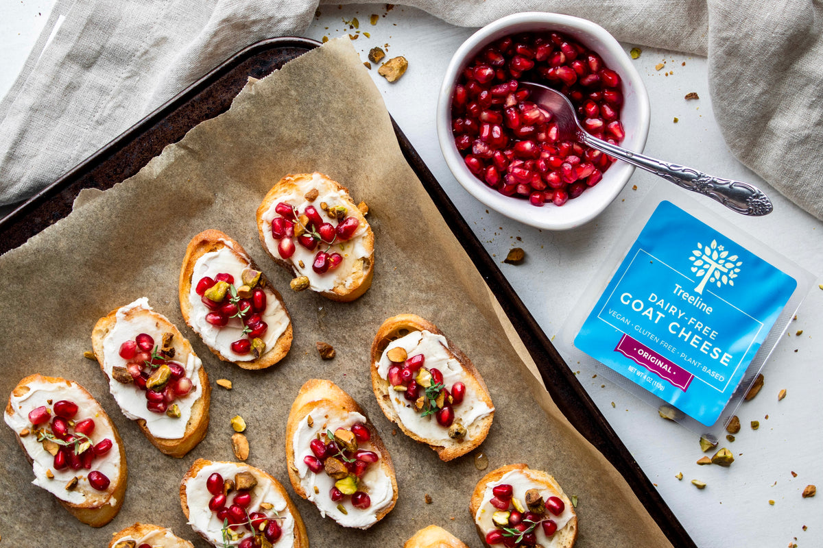 Pomegranate Pistachio Crostini with Goat Cheese Treeline Cheese