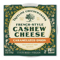 Treeline Caramelized Onion French-Style Cashew Cheese in its green and gold packaging