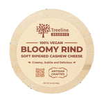 Front of circle container of Treeline Cashew Cheese Bloomy Rind 